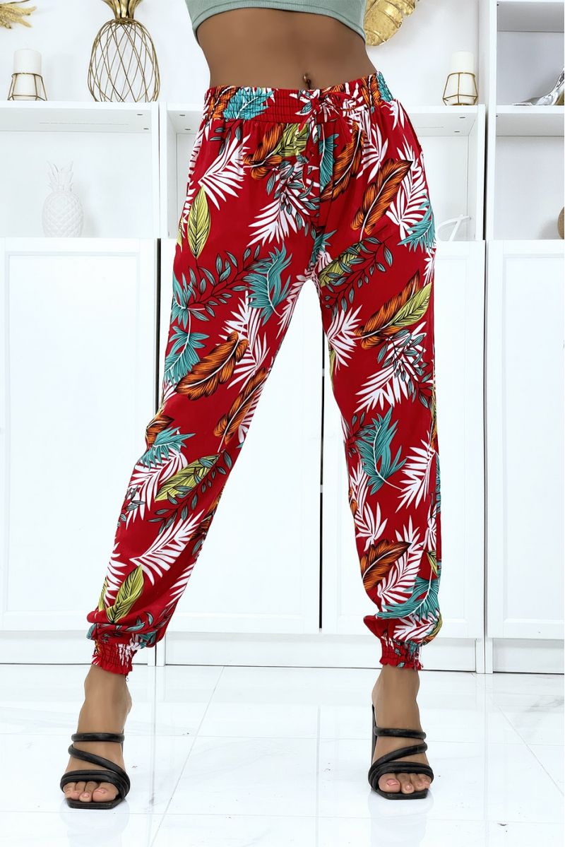 Fluid red foliage trousers with elastic waist and ankles - 1