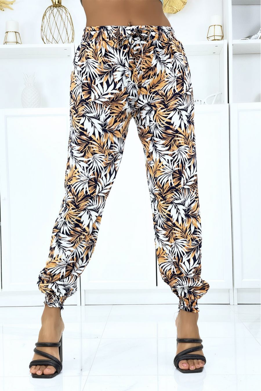 Fluid beige foliage trousers with elastic waist and ankles - 1