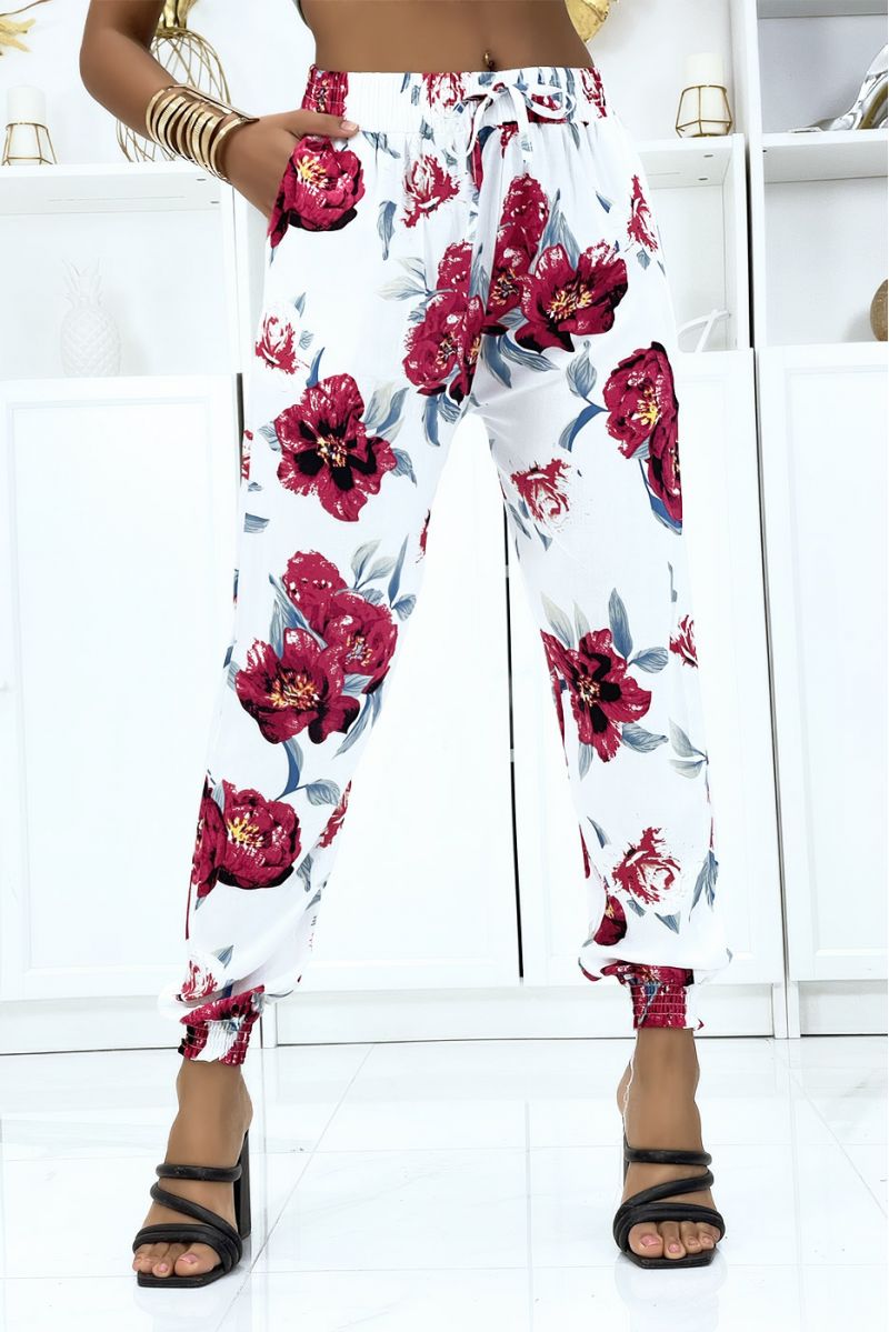 White pants with flowing flowers elastic at the waist and at the ankles - 1
