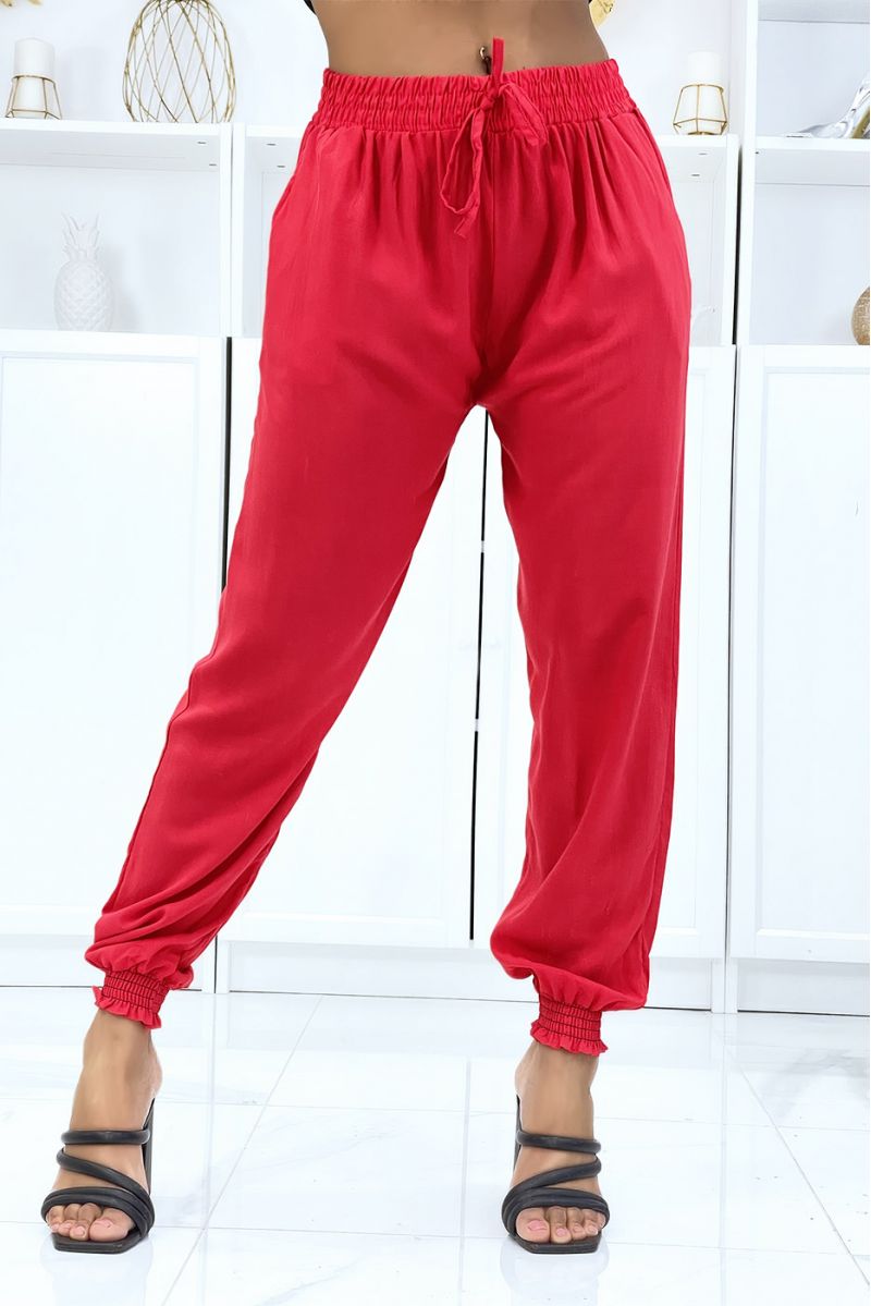 Fluid red pants with elastic waist and ankles - 1