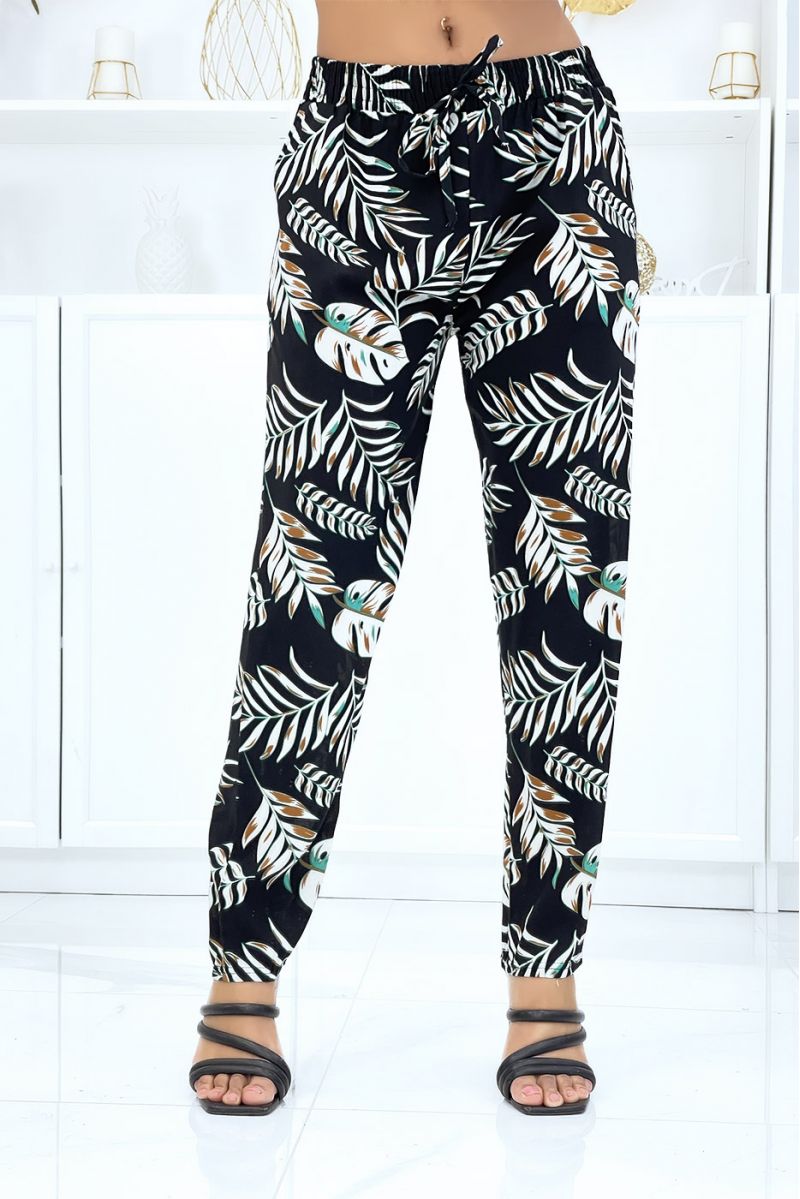 Black trousers with foliage pattern, fluid elastic at the waist - 1