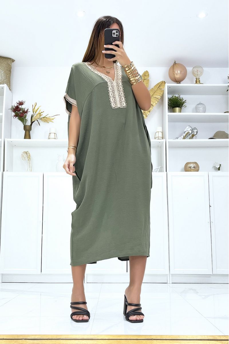 KhKKi dress with short sleeves and embroidery on the sleeves and collar - 1
