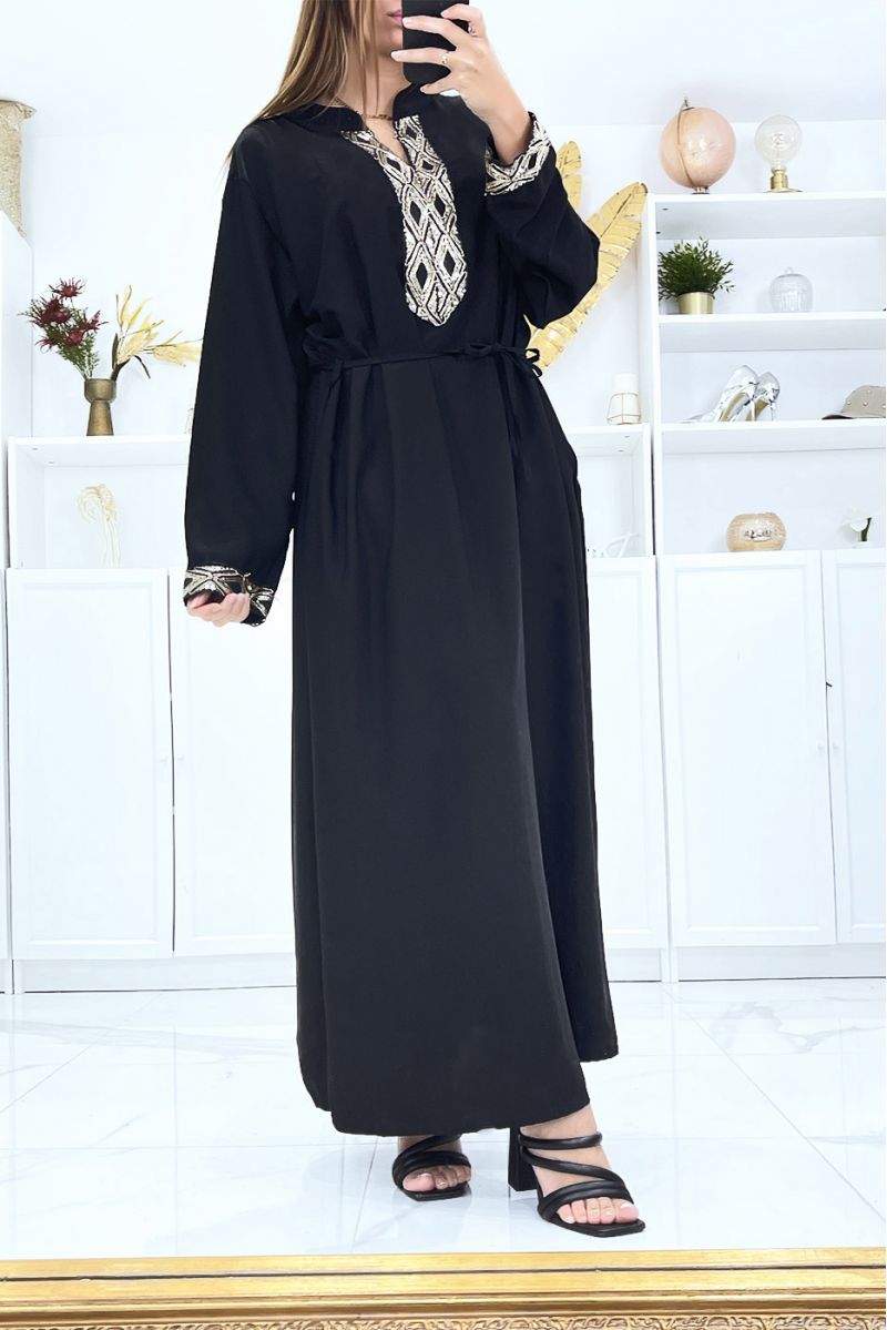 Black dress with long sleeves and sequins on the sleeves and collar - 1