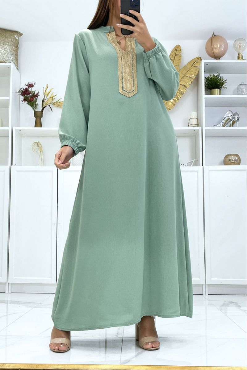 Green dress with long sleeves and gold embroidered collar - 1