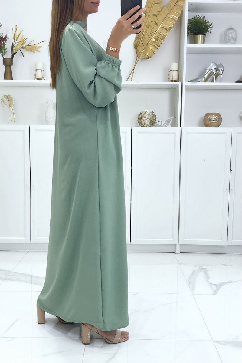 Green dress with long sleeves and gold embroidered collar - 4