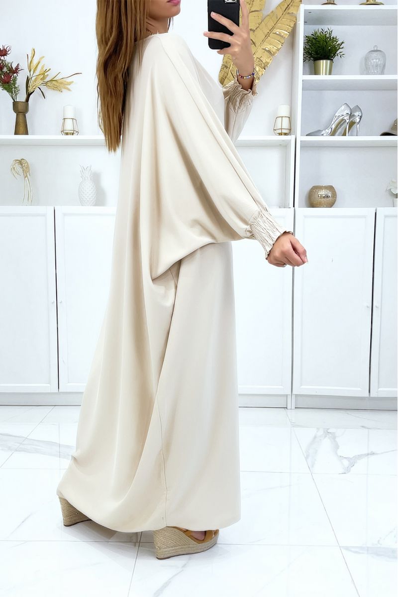 Longue abaya beige très ample avec élastique aux manches. - 2 Longue abaya beige très ample avec élastique aux manches. - 2