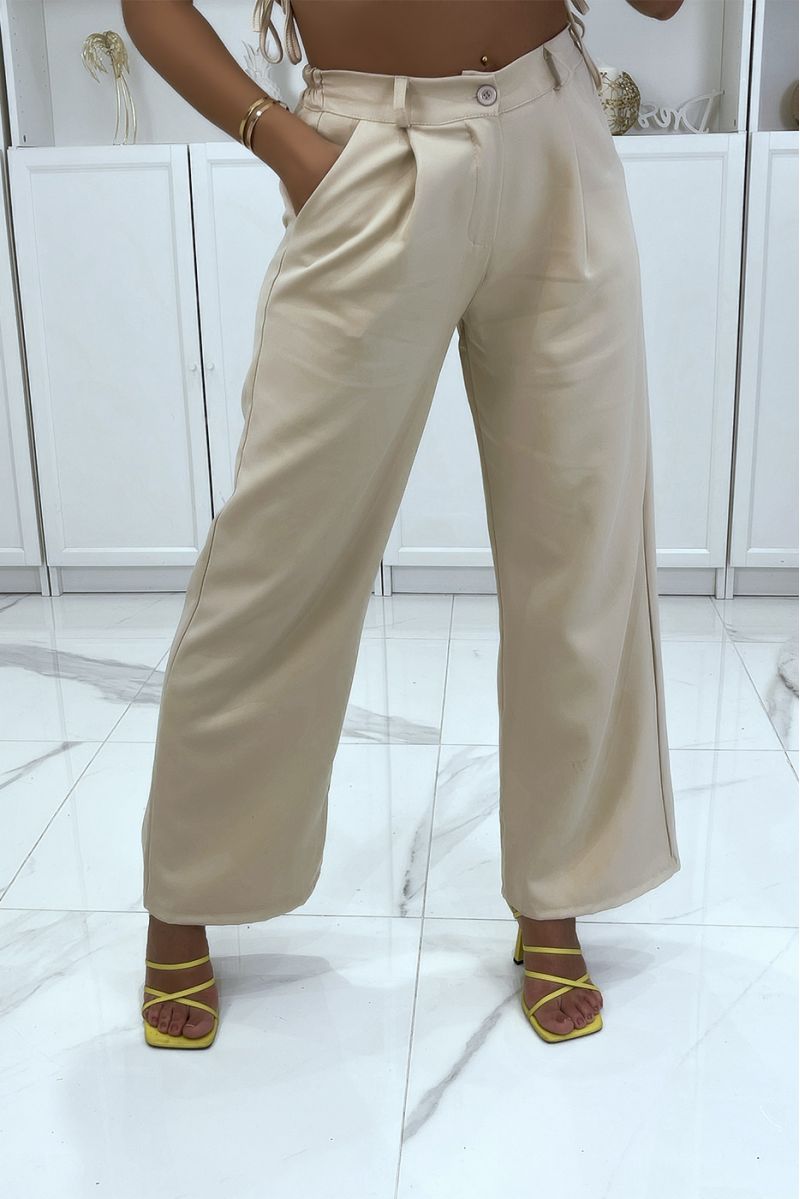 Pantalon palazzo beige avec poches et élastique au dos - 1