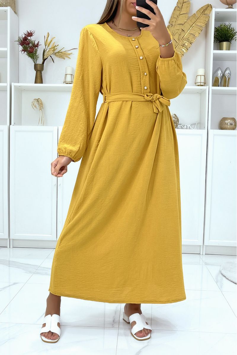 Long mustard dress with high collar and long sleeves covered and belted at the waist - 1
