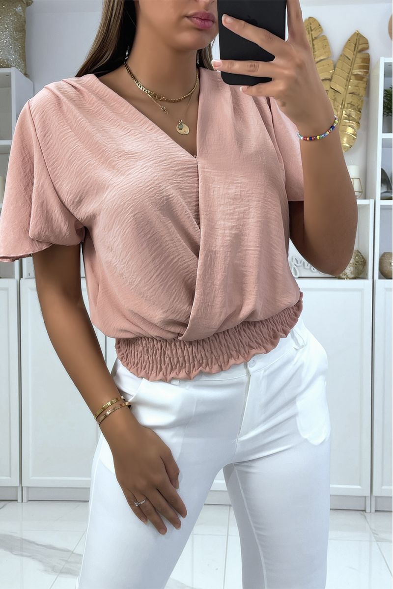 Flowing pink wrap top, fitted at the lower abdomen - 1