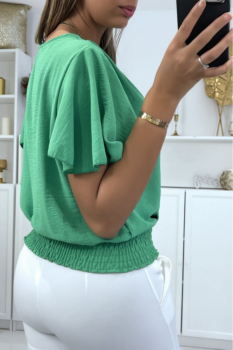 Flowing green wrap top, fitted at the lower abdomen - 3