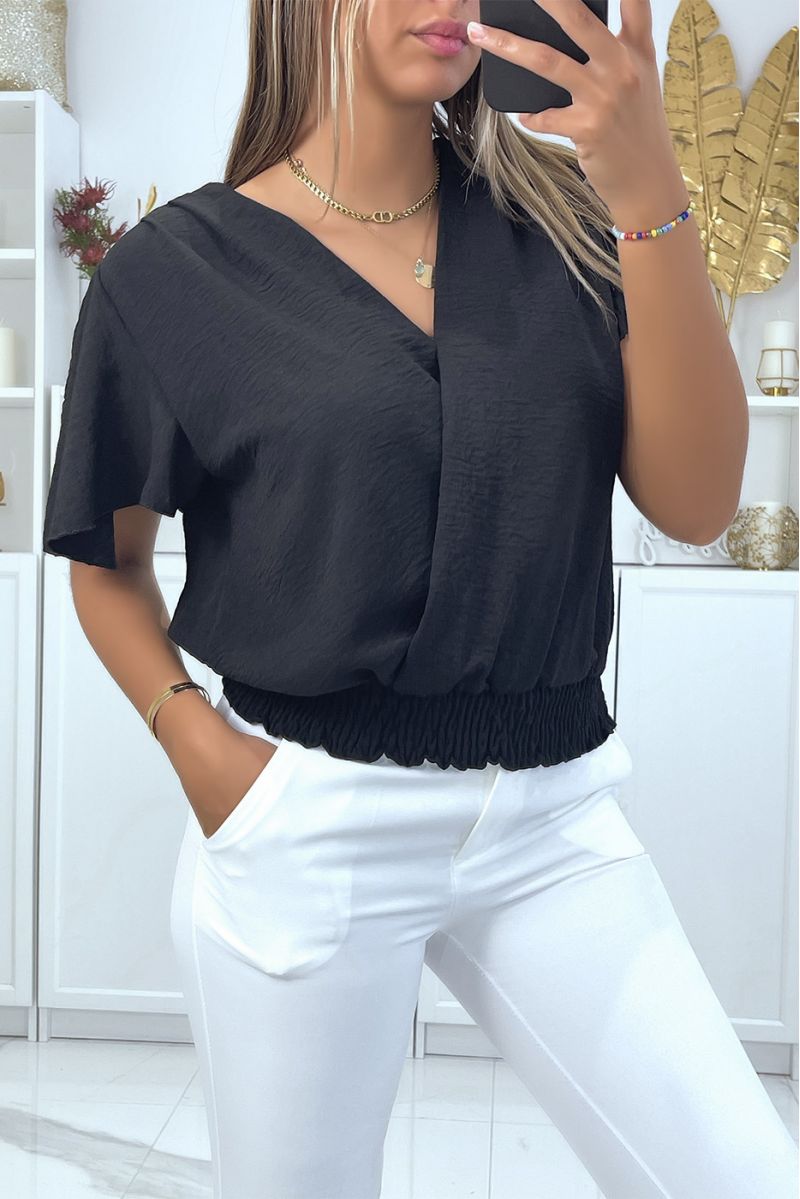 Flowing black wrap top, fitted at the lower abdomen - 2