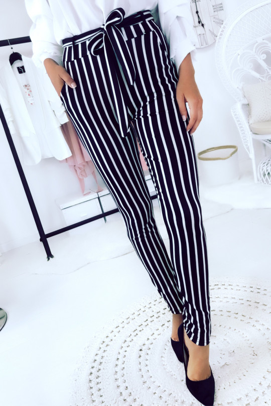 Black and white striped slim pants with pockets and belt. Pants 694 - 5