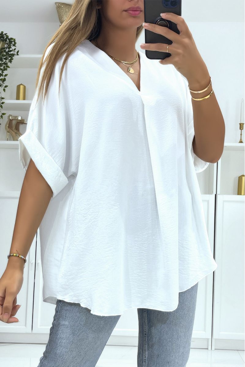 White solid color oversized top with V-neck and batwing effect sleeves - 1
