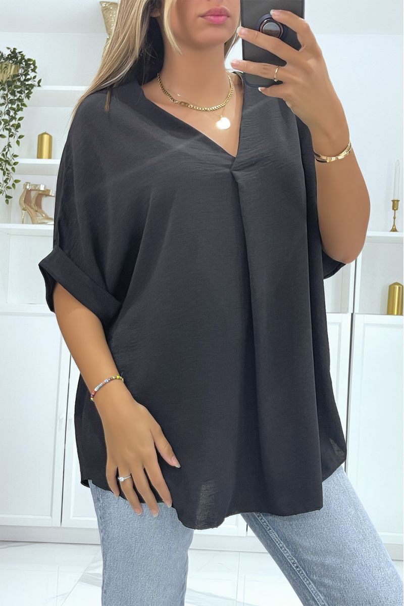 Solid color black oversized top with V-neck and batwing effect sleeves - 2
