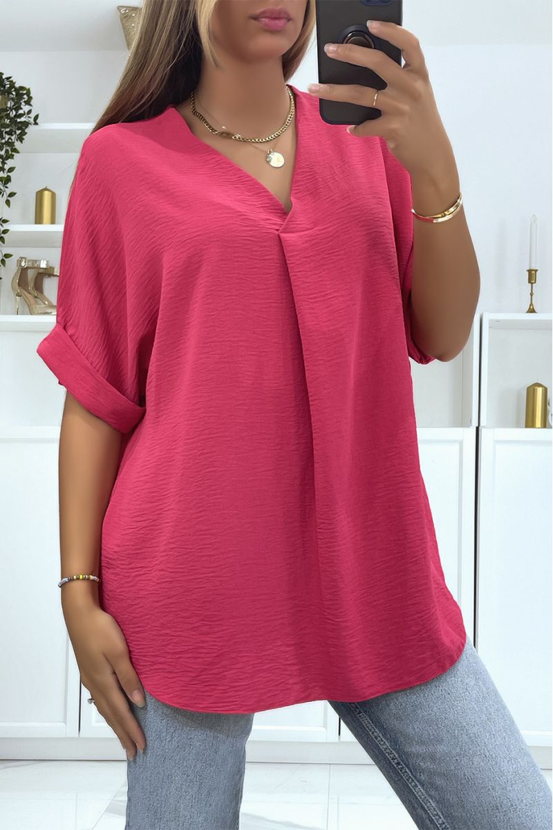 Solid color fuchsia oversized top with V-neck and batwing effect sleeves - 1