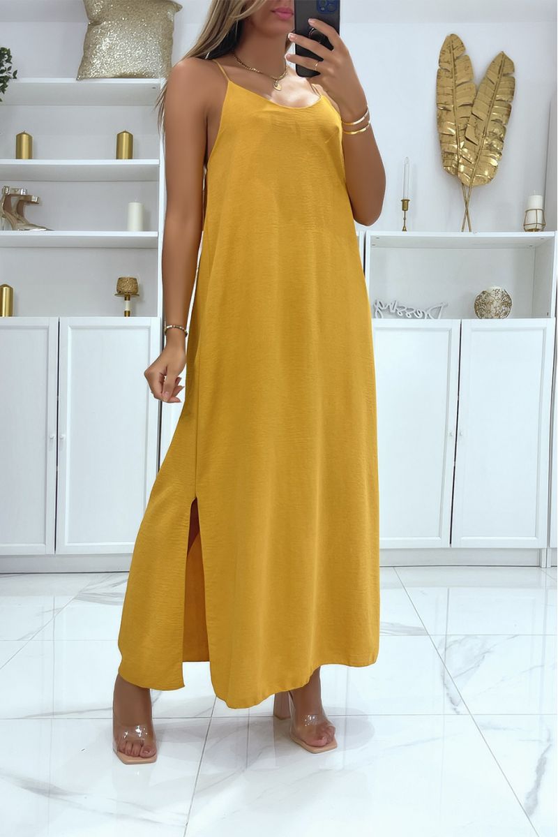 Simple mustard dress, long and split on the side with thin straps and slightly low-cut - 1