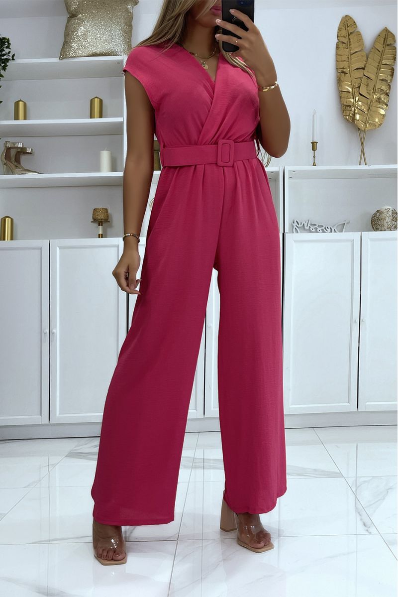 Fuchsia belted jumpsuit with flared pants and wrap effect top - 1