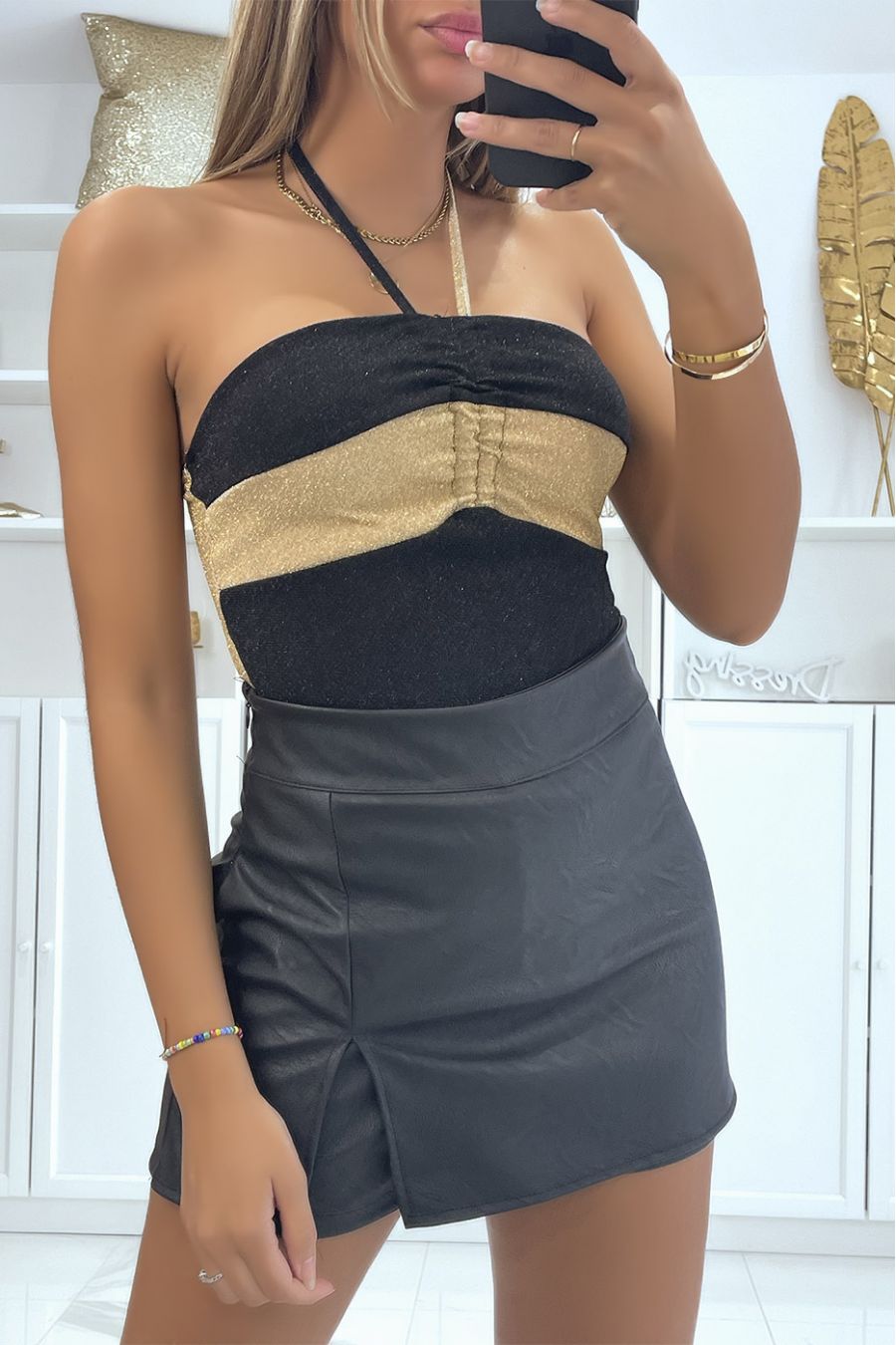 Black sequined bodysuit with gold band and crossed neck straps - 1