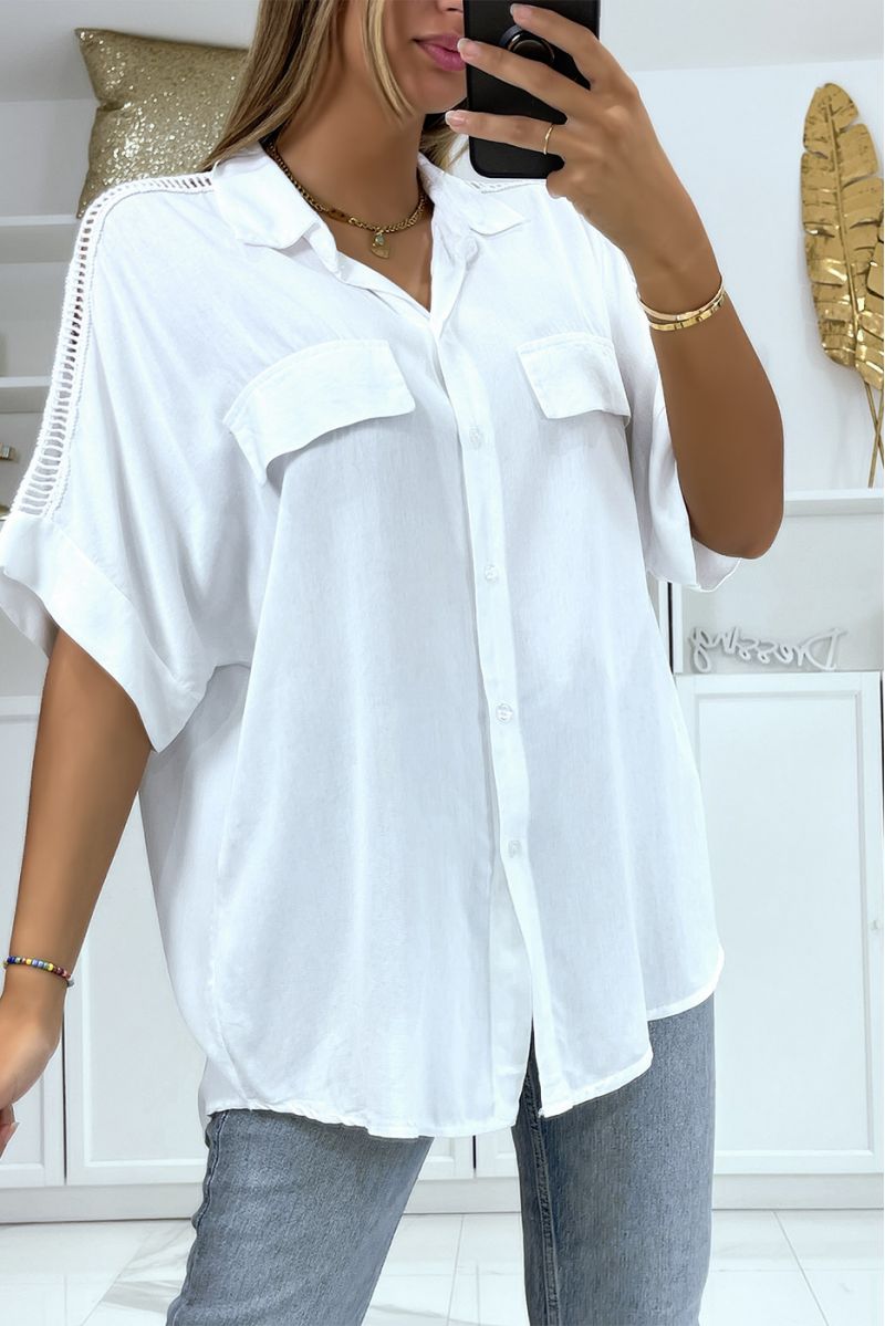 White oversized shirt with embroidery on the shoulders - 1