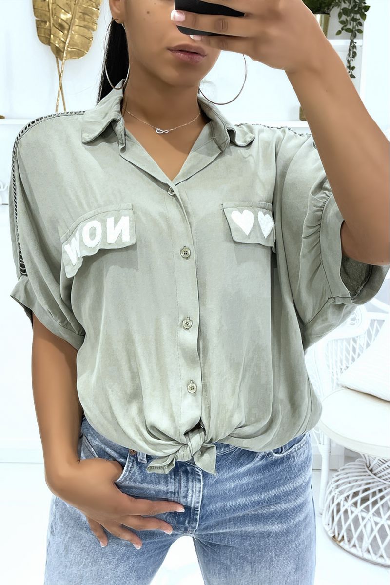 Openwork khaki shirt from shoulders to elbows with hearts and "Now" writing on the pockets - 1