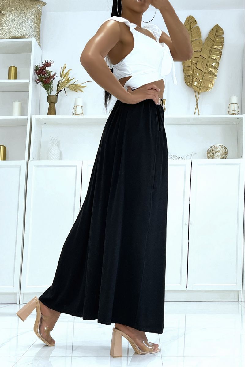 Lange supervloeiende zwarte rok met lyn-effect, elastische tailleband en riem van fijn stro - 4