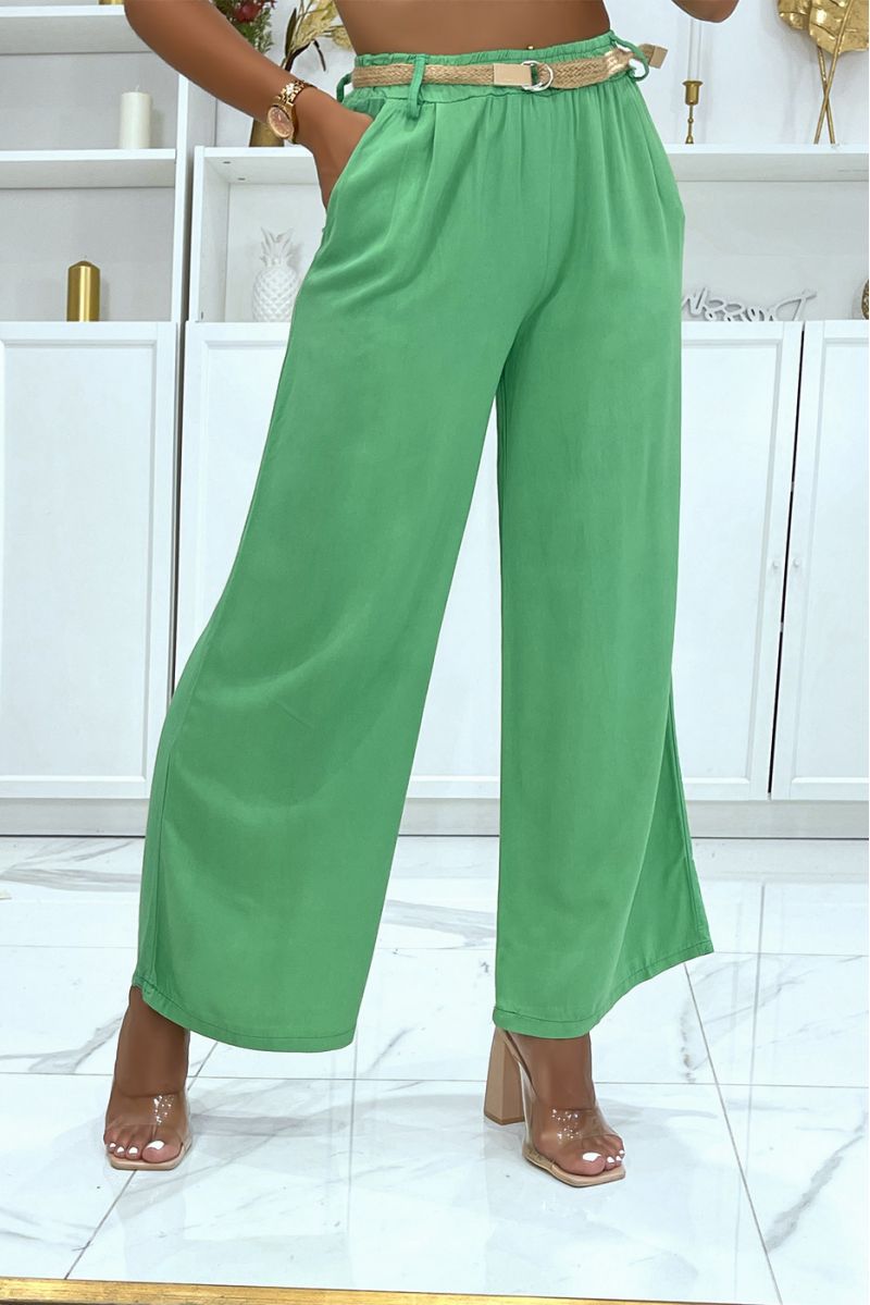 Green palazzo pants with thin straw belt, cinched at the waist - 1