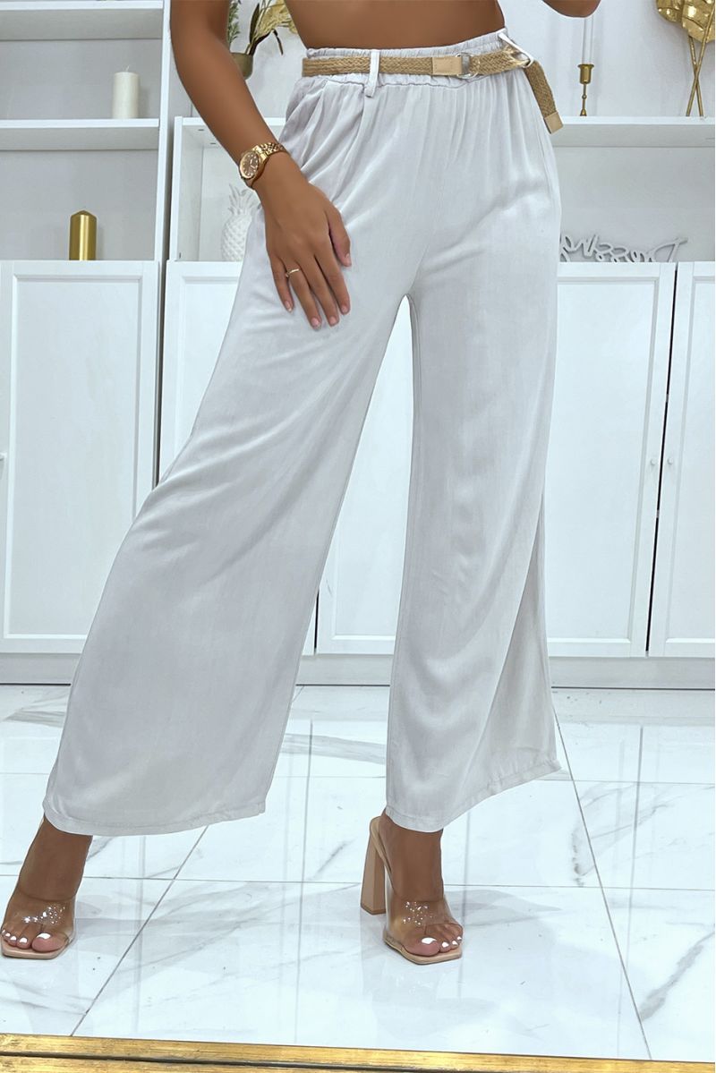 Beige palazzo pants with thin straw belt, cinched at the waist - 2