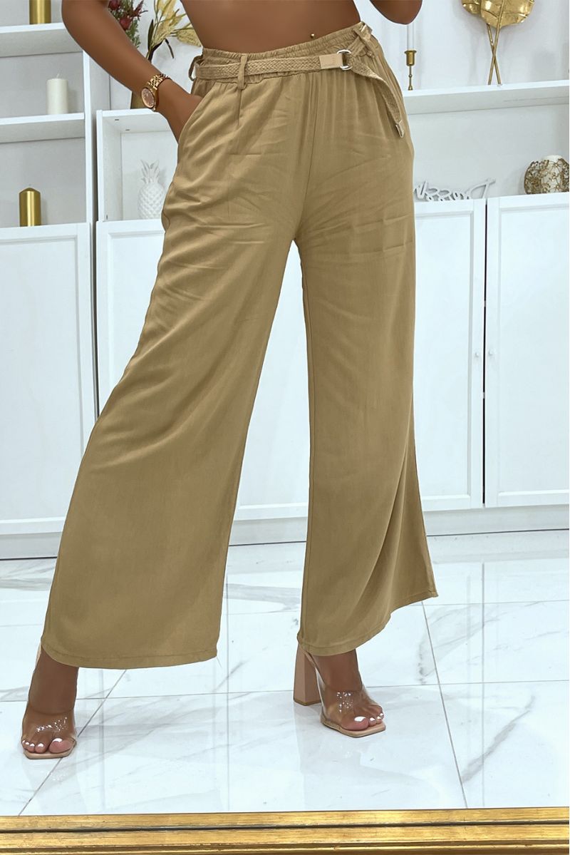 Camel palazzo pants with thin straw belt cinched at the waist - 2