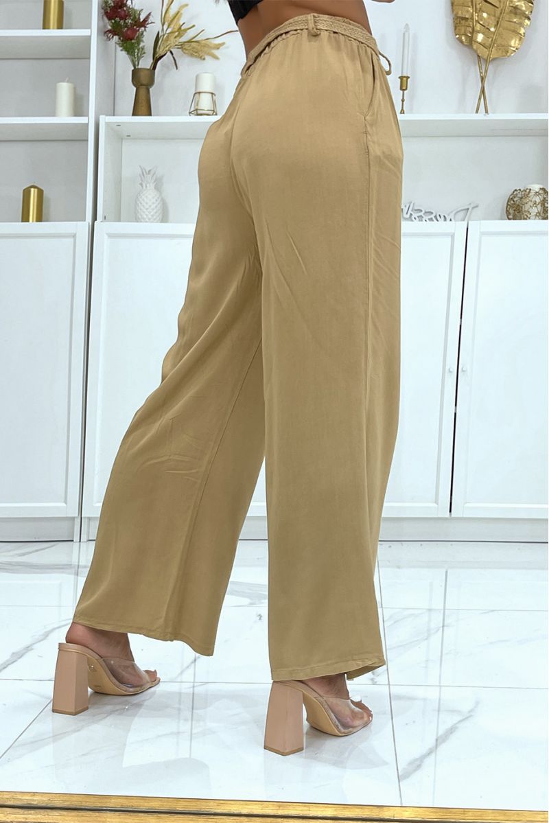 Camel palazzo pants with thin straw belt cinched at the waist - 3