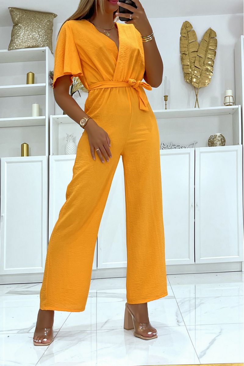 Orange wrap jumpsuit in vitamin color with belt at the waist - 1