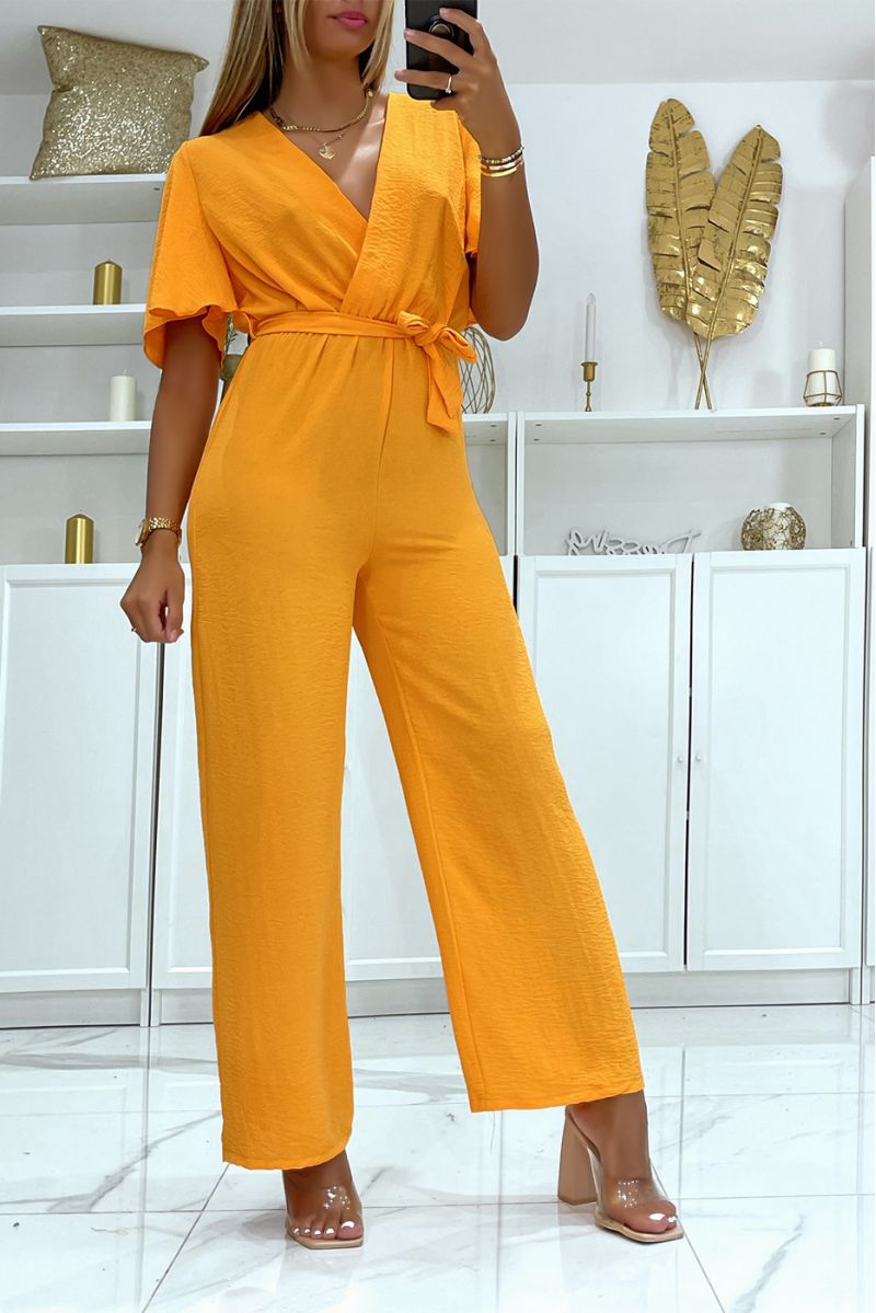 Orange wrap jumpsuit in vitamin color with belt at the waist - 2