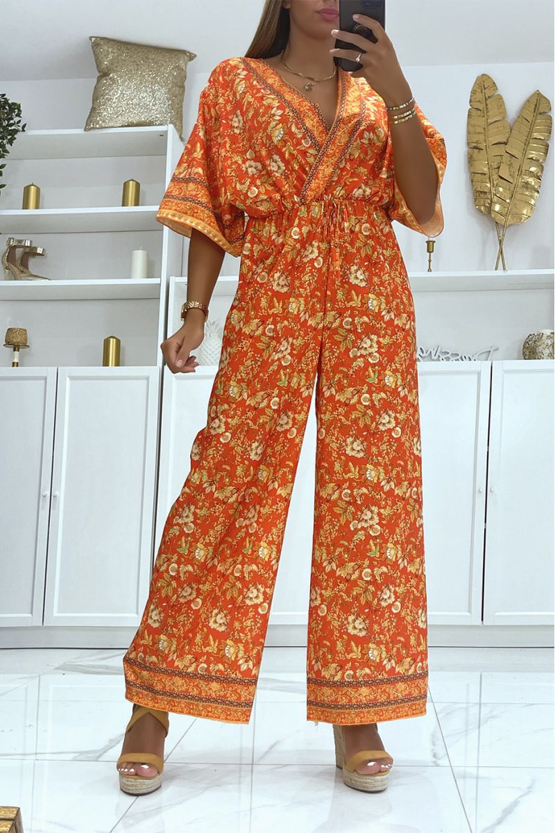 Red bell bottom jumpsuit fitted at the waist with beautiful floral print - 1