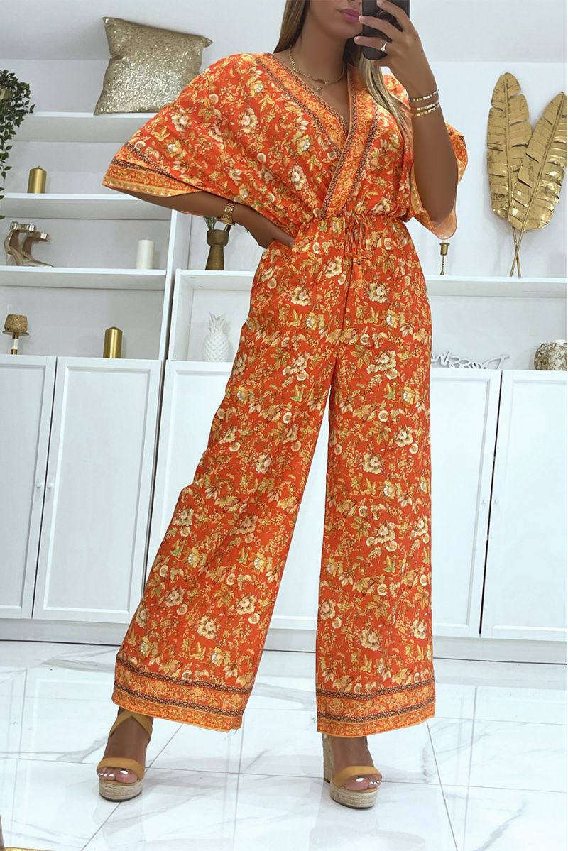 Red bell bottom jumpsuit fitted at the waist with beautiful floral print - 2