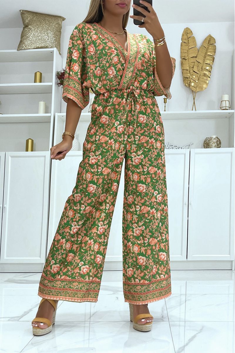 Orange and green bell bottom jumpsuit fitted at the waist with beautiful floral print - 2