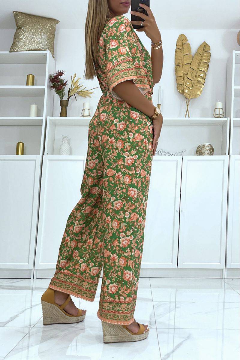 Orange and green bell bottom jumpsuit fitted at the waist with beautiful floral print - 3