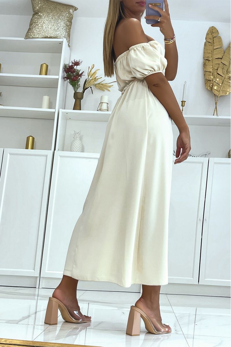 Lange beige jurk met elastische bardot kraag in de taille en split aan de zijkant met mooie riem - 1