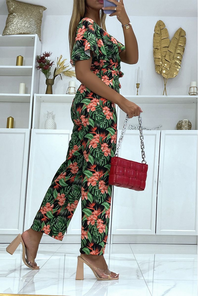 Black floral wrap jumpsuit straight cut elastic at the waist and printed with large hibiscus flowers - 1