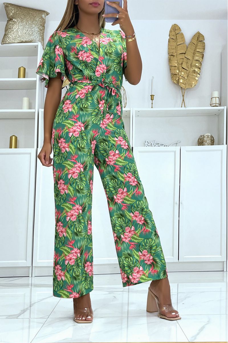 Gebloemde groene jumpsuit met overslag, recht gesneden elastiek in de taille en bedrukt met grote hibiscusbloemen - 3