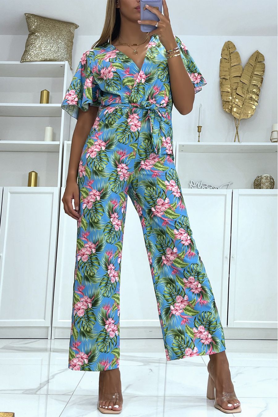 Blauwe gebloemde overslag jumpsuit recht gesneden elastiek in de taille en bedrukt met grote hibiscus bloemen - 3