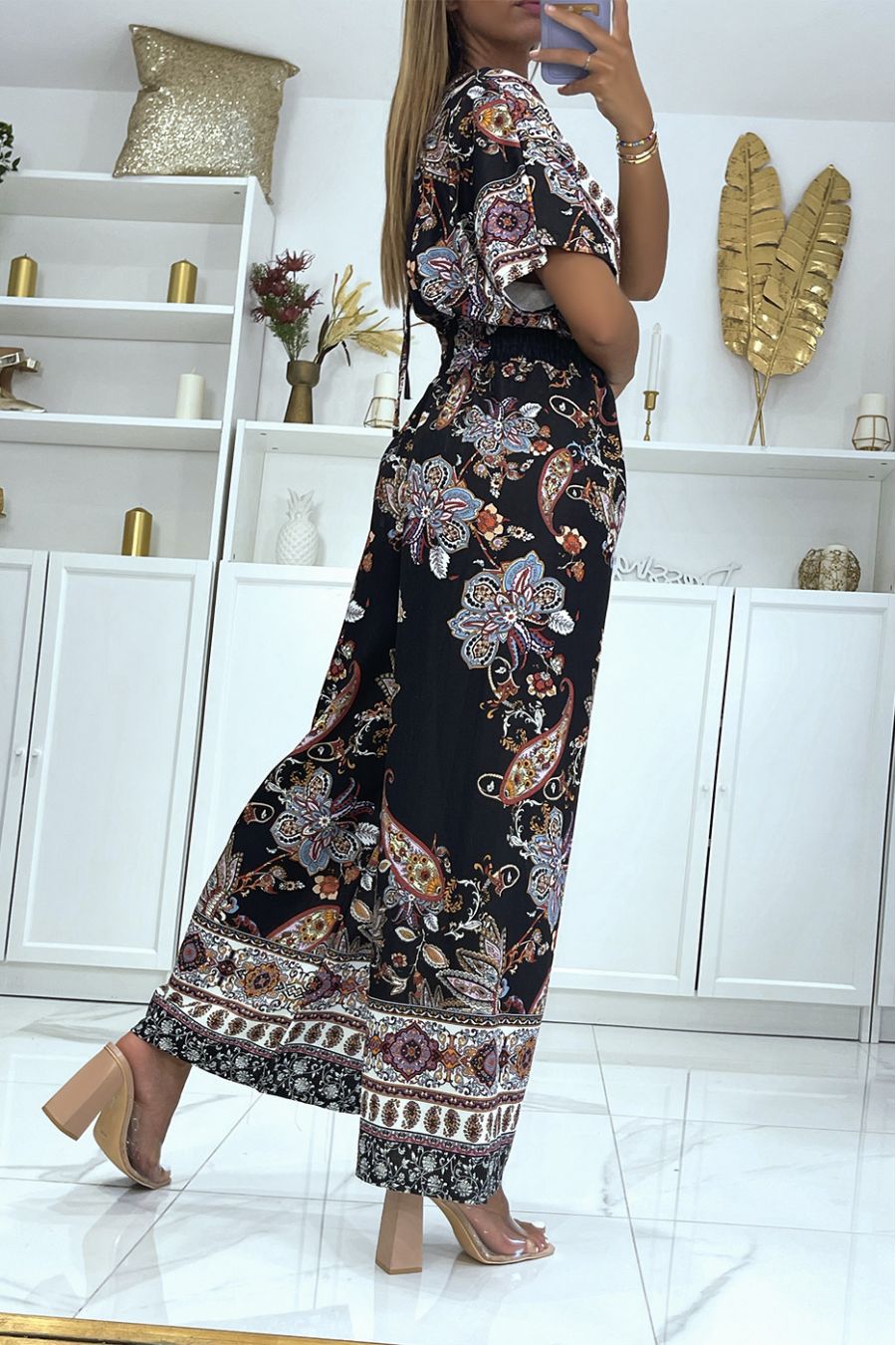 Black wrap jumpsuit and bell bottom pants with elastic waistband and print - 1