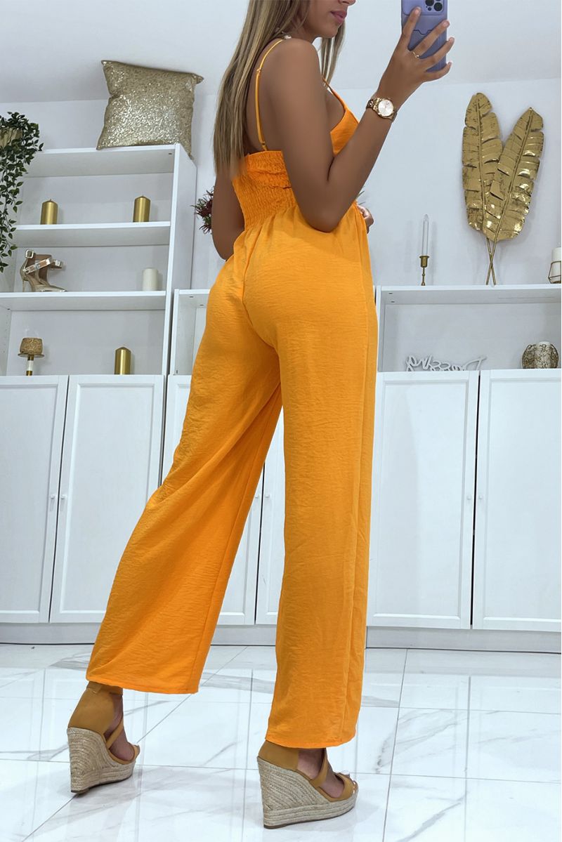 Orange elephant leg jumpsuit with light neckline, thin straps and fitted at the waist - 4