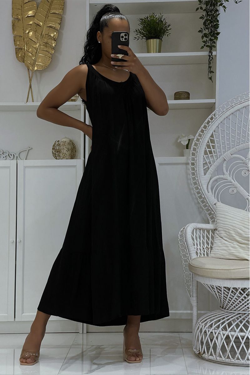 Long oversized black dress with wide straps and openwork at the collar with ruffles in bah - 1