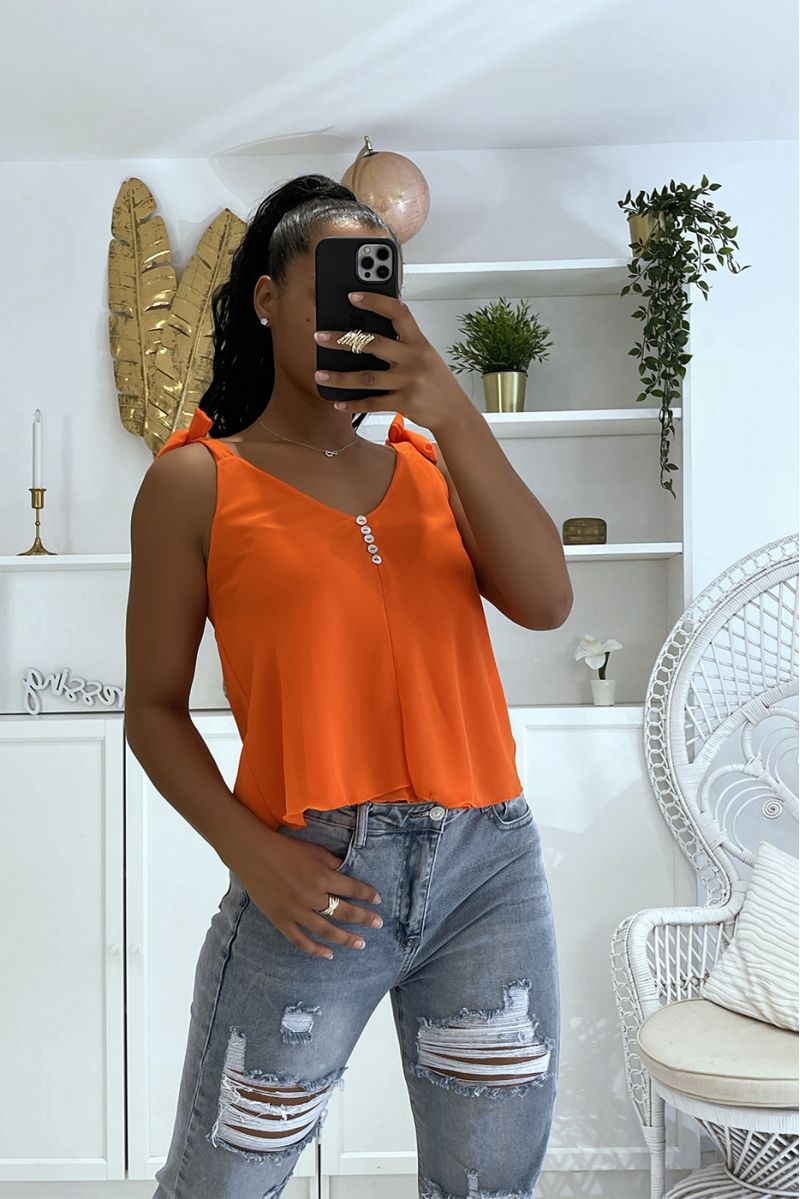 Oranje tanktop met strik op de bandjes en kleine knoopjes op de borst - 3