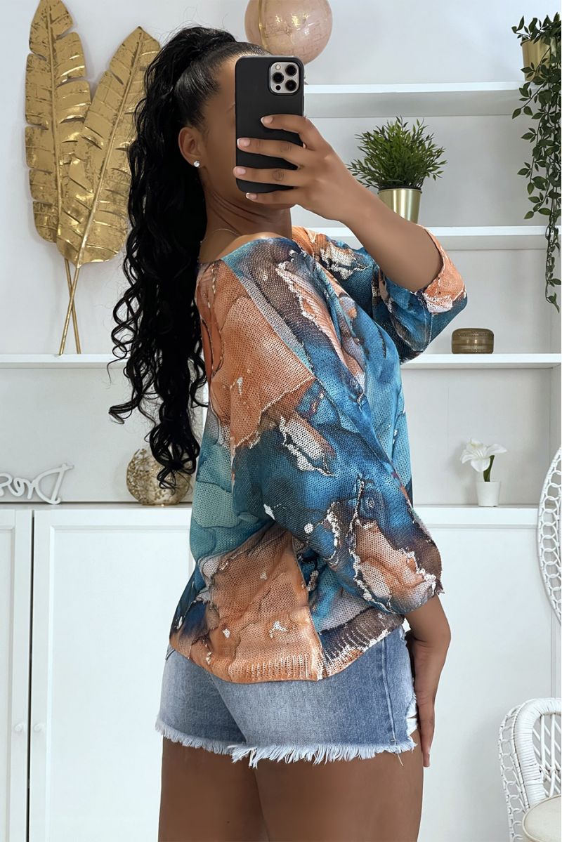 Loose turquoise blue knit top with half-length sleeves and mix of orange and blue - 1