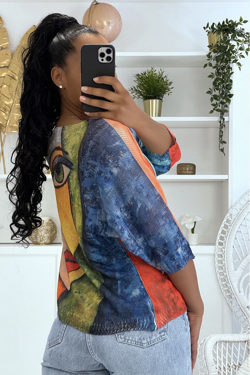Loose royal orange and green knit top with half-length sleeves and drawings of a face - 1