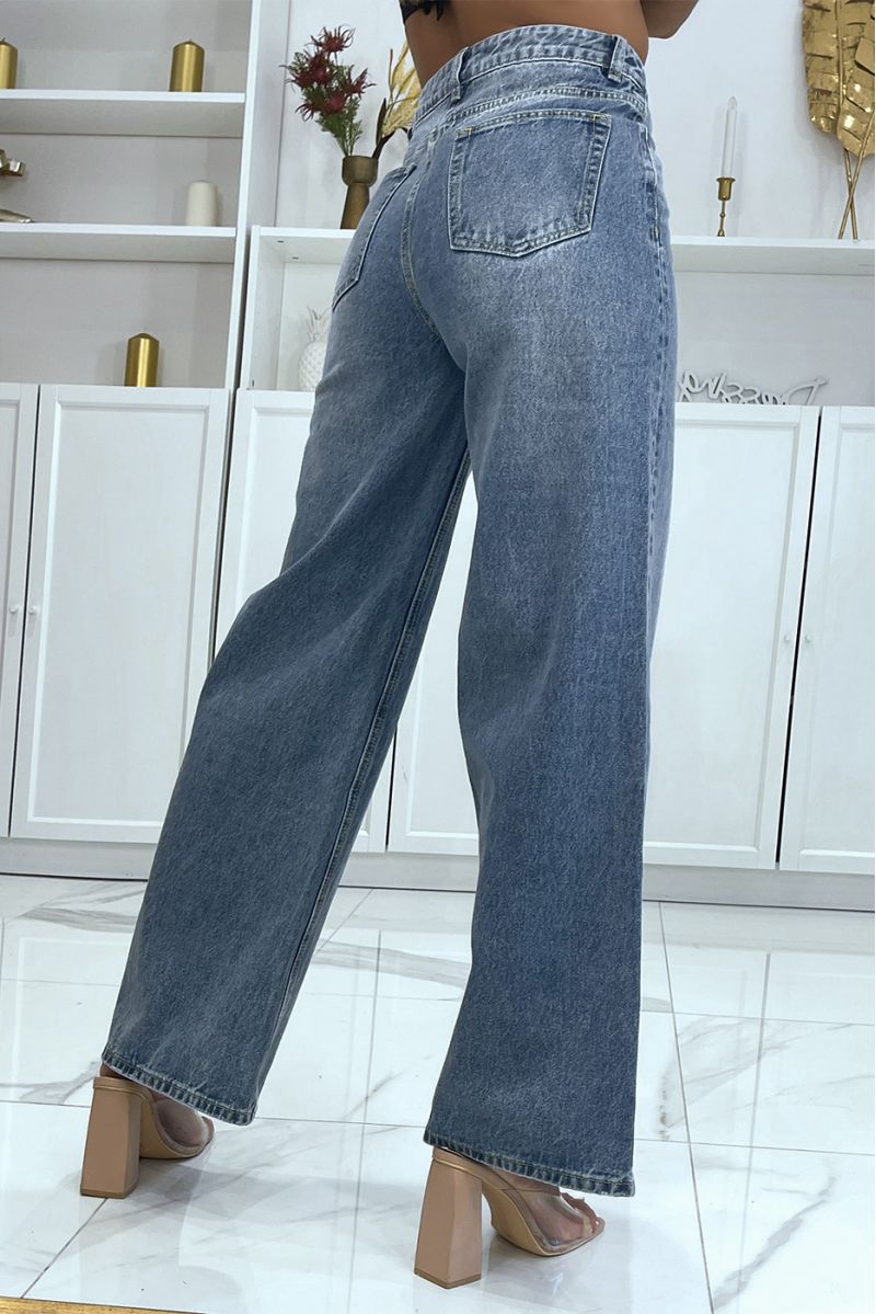 Blue jeans with wide bell bottom and fitted at the waist - 4