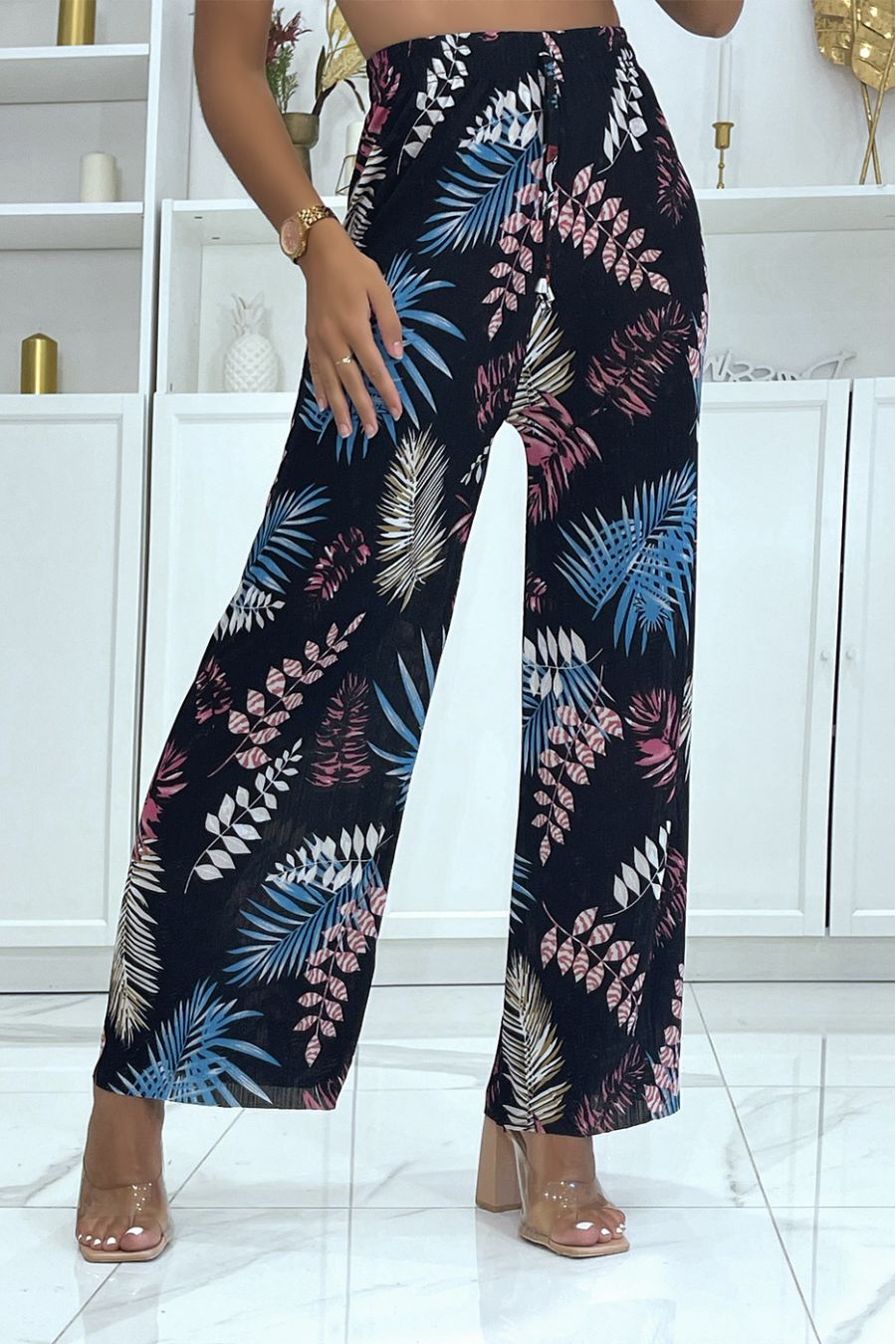 Bell-bottom pants with black and blue floral and foliage print fitted at the waist - 1