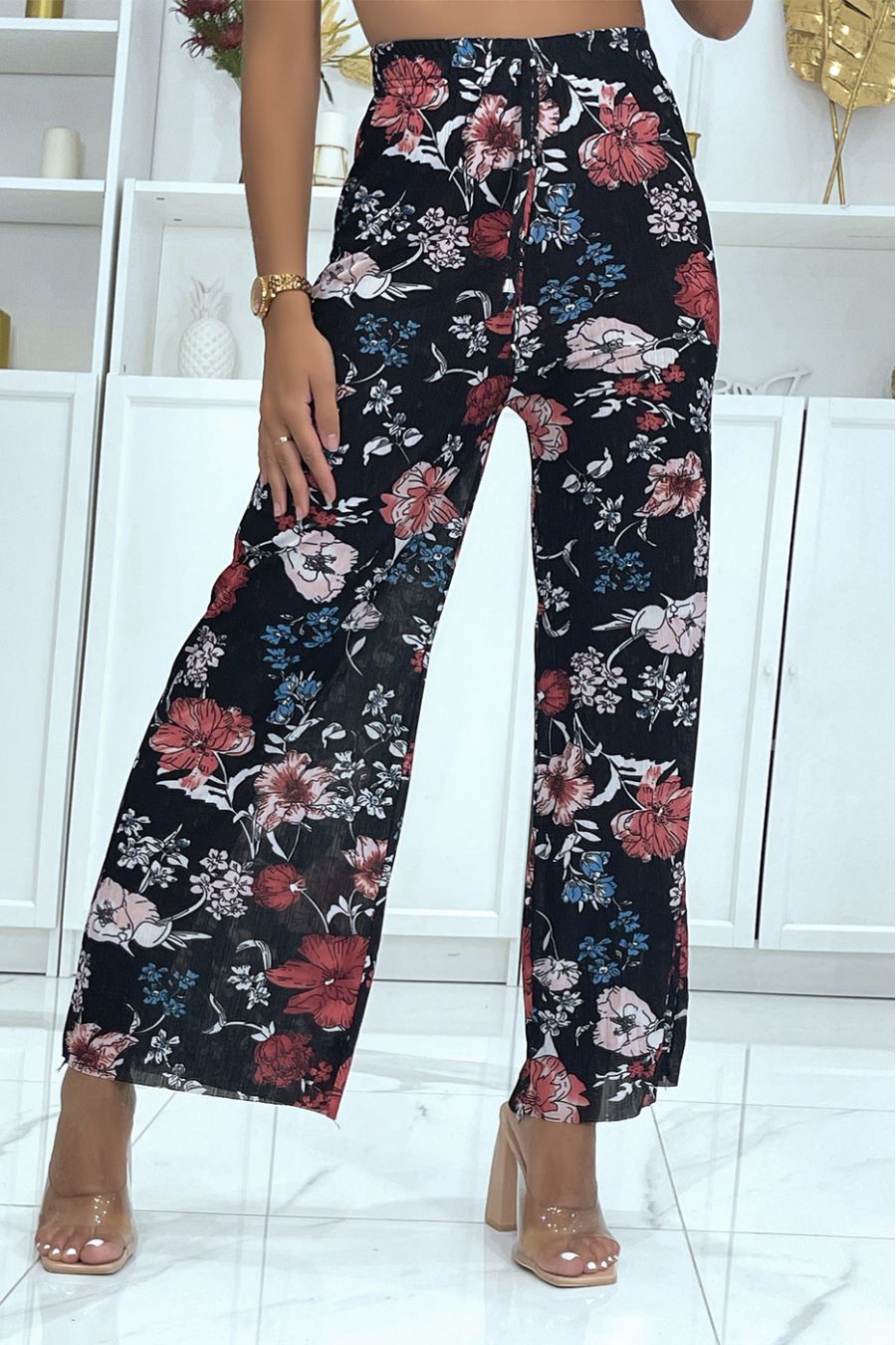 Black bell bottom pants with floral print and foliage fitted at the waist - 2
