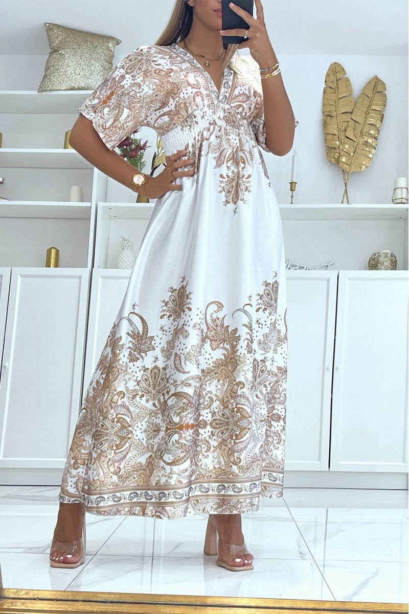 Lange witte jurk met gebladerte print gekruist op de borst en op de rug en split aan de zijkanten