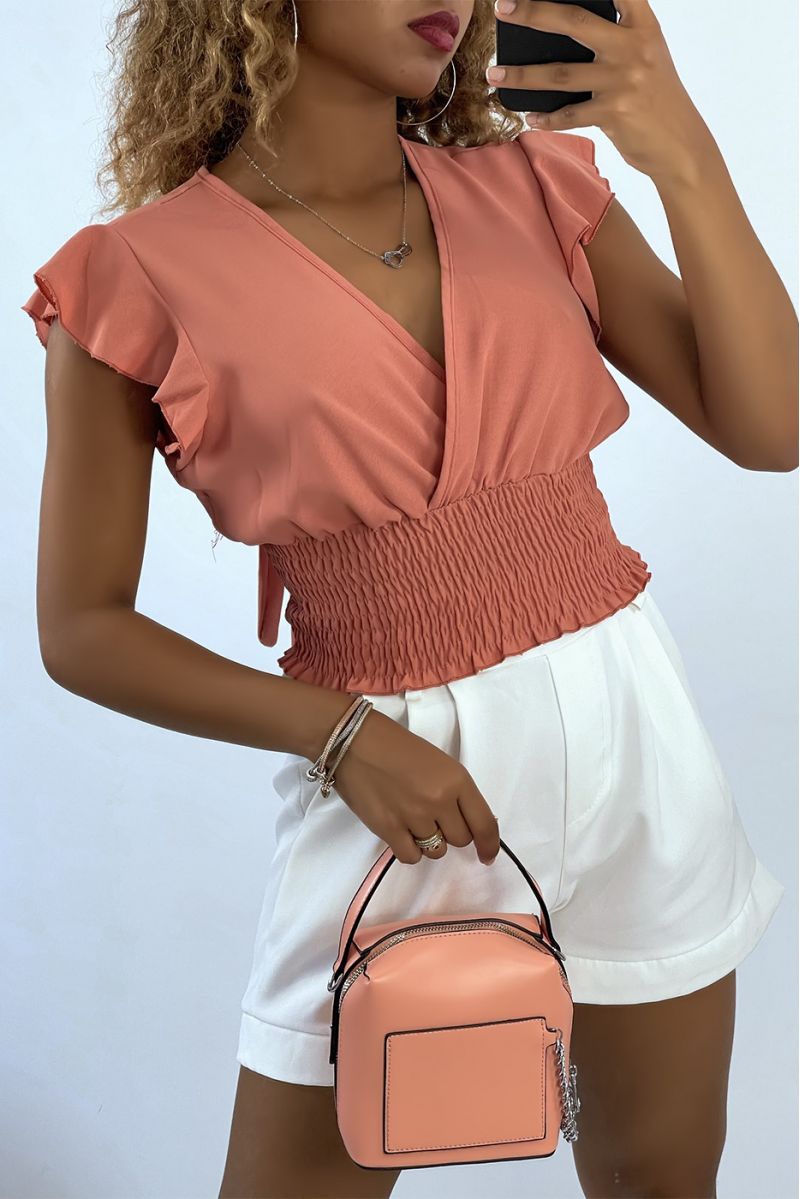 Soepelvallende koraalkleurige crop top met elastische wikkelhalslijn - 1